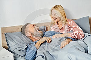 A mature couple in cozy homewear