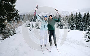 Mature couple cross country skiing outdoors in winter nature, Tatra mountains Slovakia.