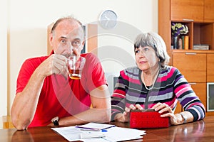 Mature couple did not have the money on your loan repayments photo