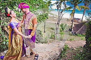 Mature couple dressed in Balinese costume