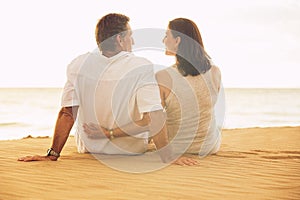 Mature Couple Enjoying Sunset on the Beach