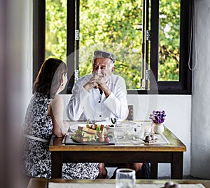 Mature couple having lunch at a restaurant