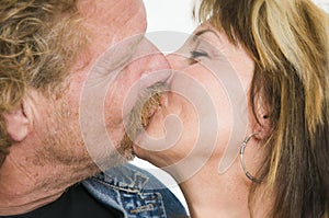 Mature couple kissing