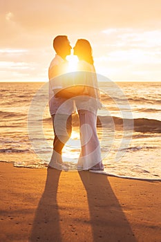 Mature Couple Kissing at Sunset