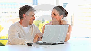 Mature couple with a laptop