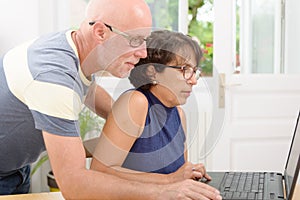 Mature couple with a laptop