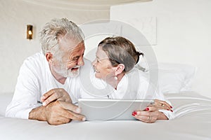 Mature couple in a luxurious hotel room