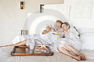 Mature couple in a luxurious hotel room