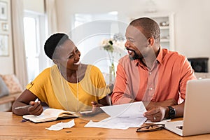 Mature couple managing home finance