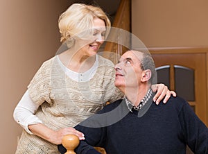 Mature couple near staircase