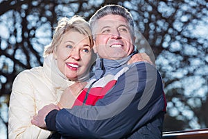 Mature couple on park bench