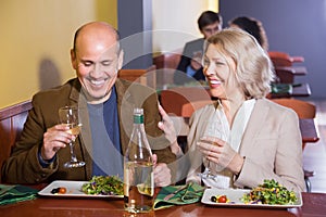 Mature couple spending time in restaurant