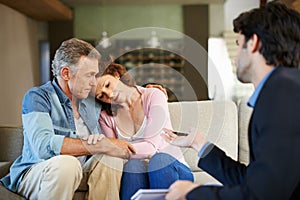 Mature couple, therapist and support in house for relationship for depression in health, stress and advice. Man, woman