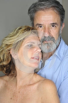 Mature couple together embracing smiling photo