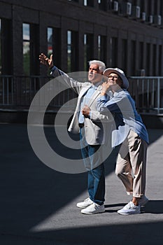 Mature couple walking around the city and sightseeing.