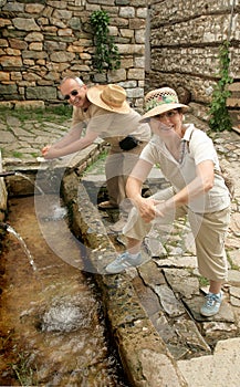 Mature Couple Washing Hands