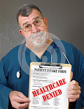 Mature Doctor Displays Healthcare Denied