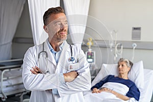 Mature doctor thinking at hospital