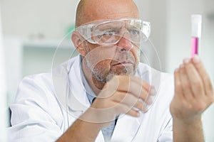 Mature engineer working in laboratory