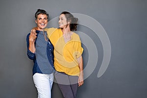 Mature friends women laughing together