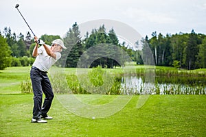 Mature Golfer on a Golf Course photo