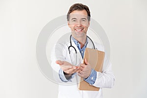 Mature handsome doctor lending hand requesting money for service