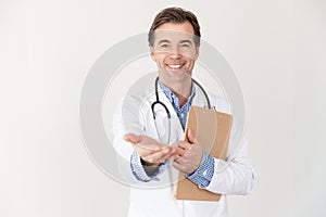 Mature handsome doctor lending hand requesting money for service photo