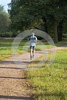 Mature healthy man jogging