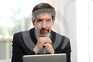 Mature Hispanic businessman photo