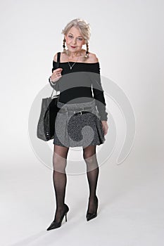 Mature Lady with big bag photo