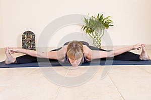 Mature lady doing yoga