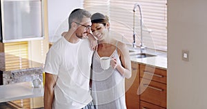 Mature love couple in morning kitchen house, apartment or home to relax, smile and breakfast together. Romantic man and