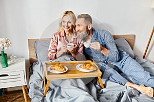 A mature loving couple in cozy