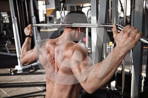 Mature male athlete working out at the gym