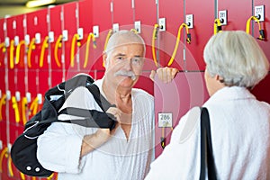 Mature male in front lockers