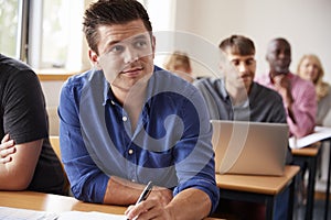 Mature Male Student Attending Adult Education Class photo