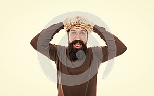 mature man with beard in earflap hat. beard hair care. hipster  on white.