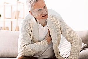 Mature man with chest pain, suffering from heart attack