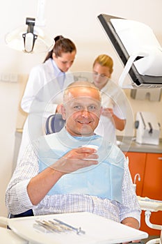 Mature man at dental office surgery