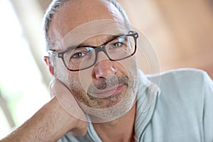 Mature man with eyeglasses looking at camera