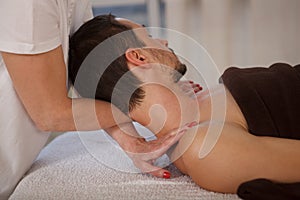 Mature man getting professional massage