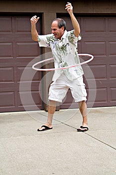 Mature man with hula hoop!