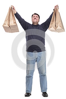 Mature man in jeans striding forward.isolated on a white background.