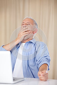 Mature man, laptop and yawn or tired, fatigue and burnout for challenge on technology. Male person, internet and