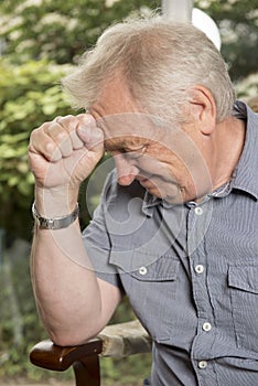 Mature man looking worried