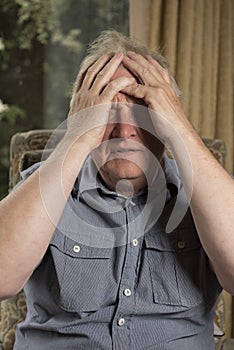 Mature man looking worried