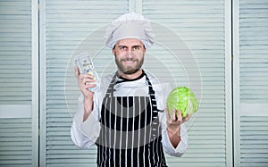 Mature man love organic healthy food. Money business. professional chef cook in restaurant kitchen. vegetarian. Diet