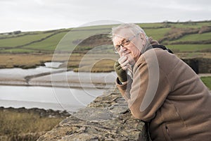 Mature man outdoors looking at camera