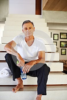 Mature man, portrait and stairs for workout, fitness and wellness for health and smile. Guy, apple and water for food