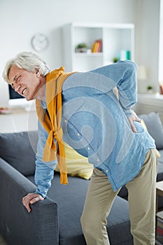 Mature Man Suffering from Back Pain